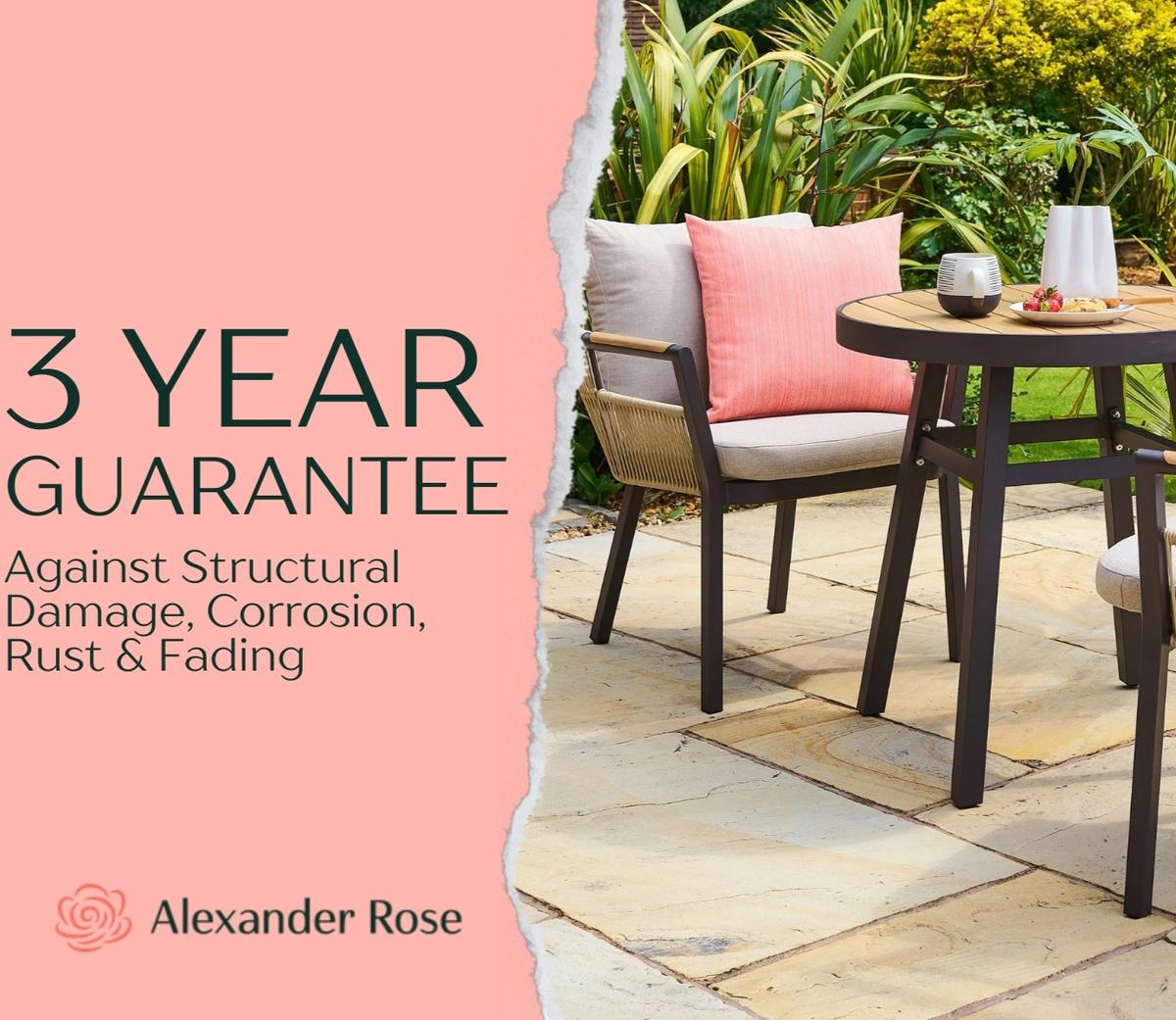 Modern garden furniture set with cushioned chairs and round wooden table on a stone patio, highlighted by a 3-year guarantee against damage, rust, and fading.
