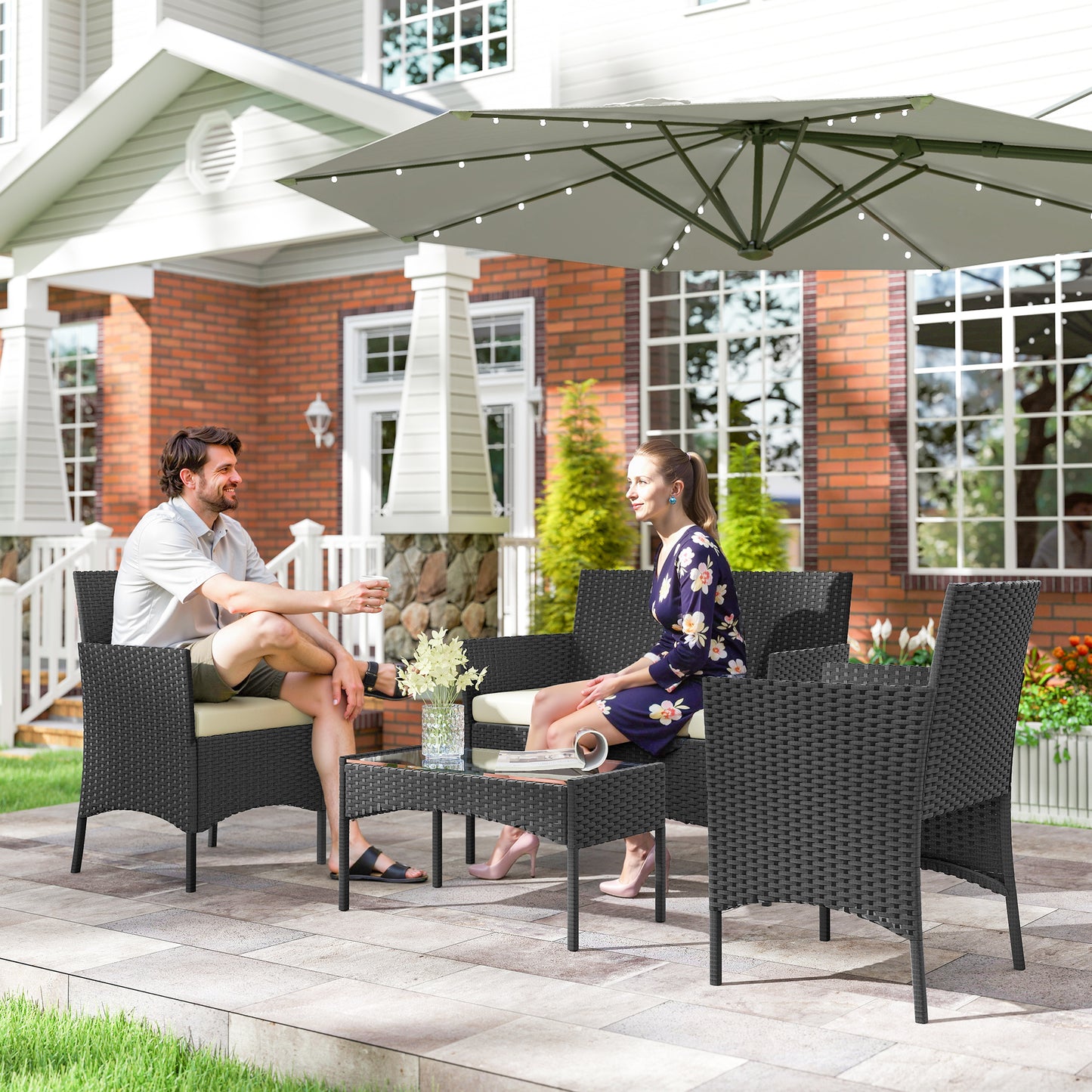 Santorini 4 Piece Rattan Garden Furniture Sofa Set with Loveseat, Armchairs, Glass-Top Coffee Table and Cushions