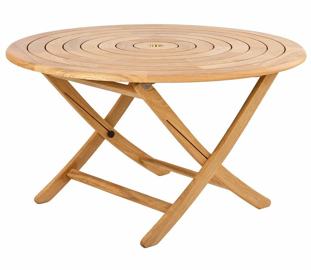 Folding round wooden outdoor table with circular pattern on the tabletop. Constructed from natural teak wood, ideal for garden or patio use, offering a rustic charm.