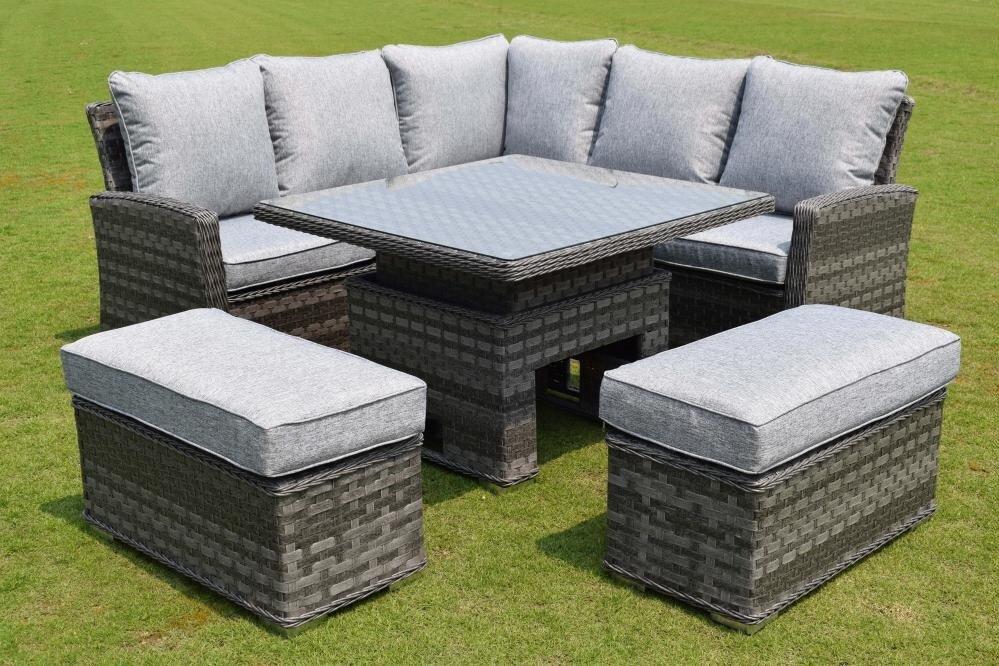 Outdoor sectional furniture set with grey cushions on rattan base, featuring a matching dining table and ottomans, perfect for garden or patio relaxation.