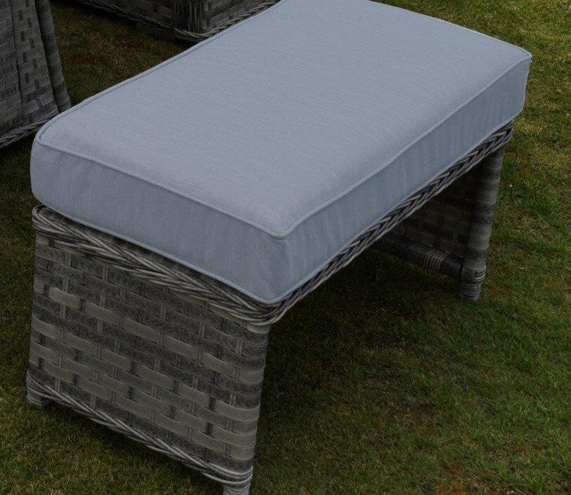 Outdoor garden bench with grey rattan frame and a cushioned seat, ideal for patio or garden use. Features a woven design, providing comfort and style on a grassy lawn.