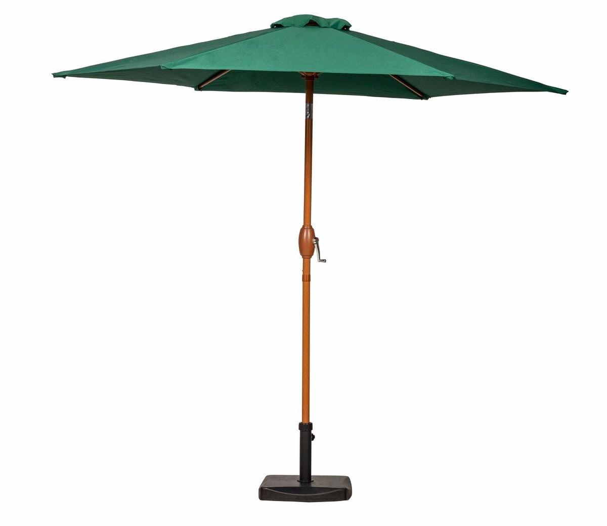 Green patio umbrella with wooden pole and hand crank, standing on a sturdy base. Ideal for garden or outdoor spaces, providing shade and style on sunny days.