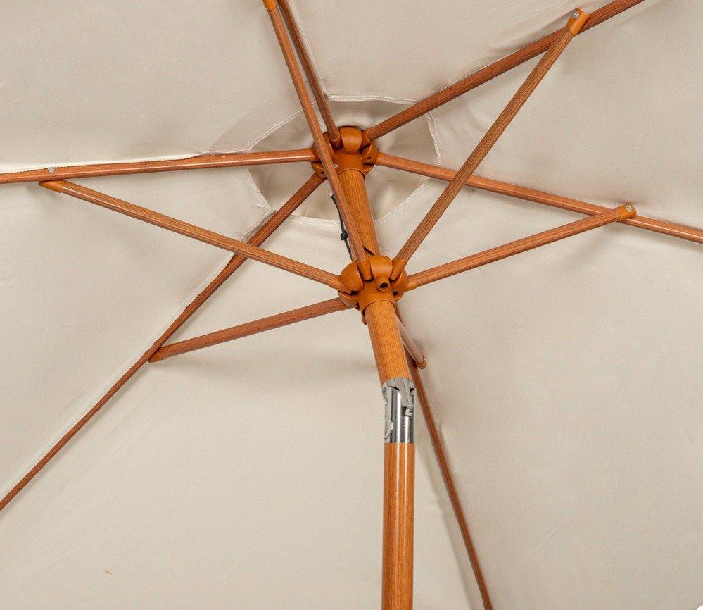 Close-up of a beige patio umbrella's wooden frame and ribs, showcasing the detailed craftsmanship and sturdy construction suitable for outdoor use.